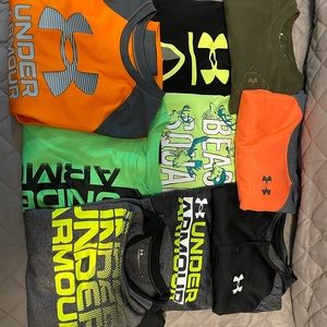 Bundle of UA shirts, 8 long sleeve, 1 short sleeve, some never worn. Size 6 boys